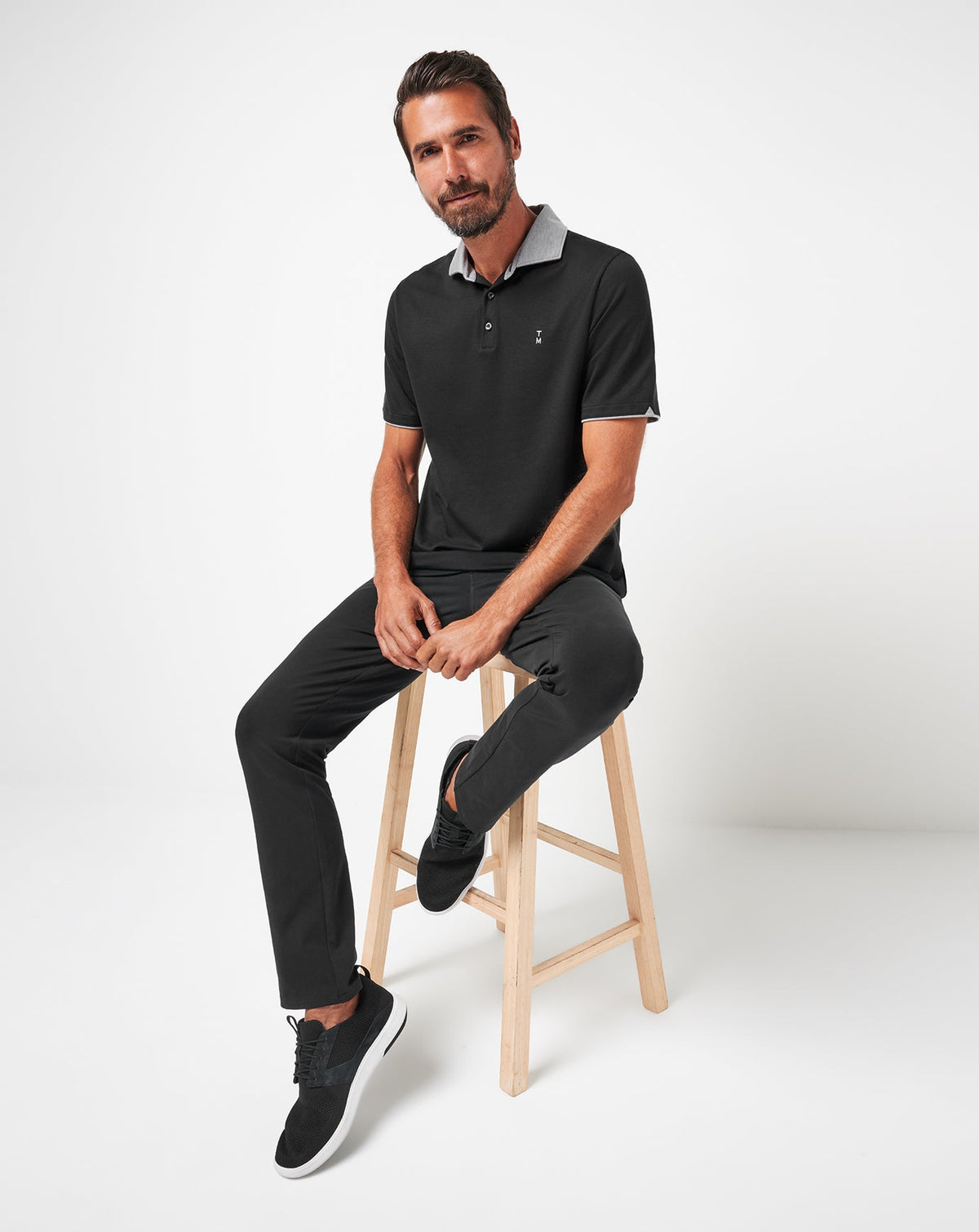 TravisMathew | Reservation Number Polo - Black