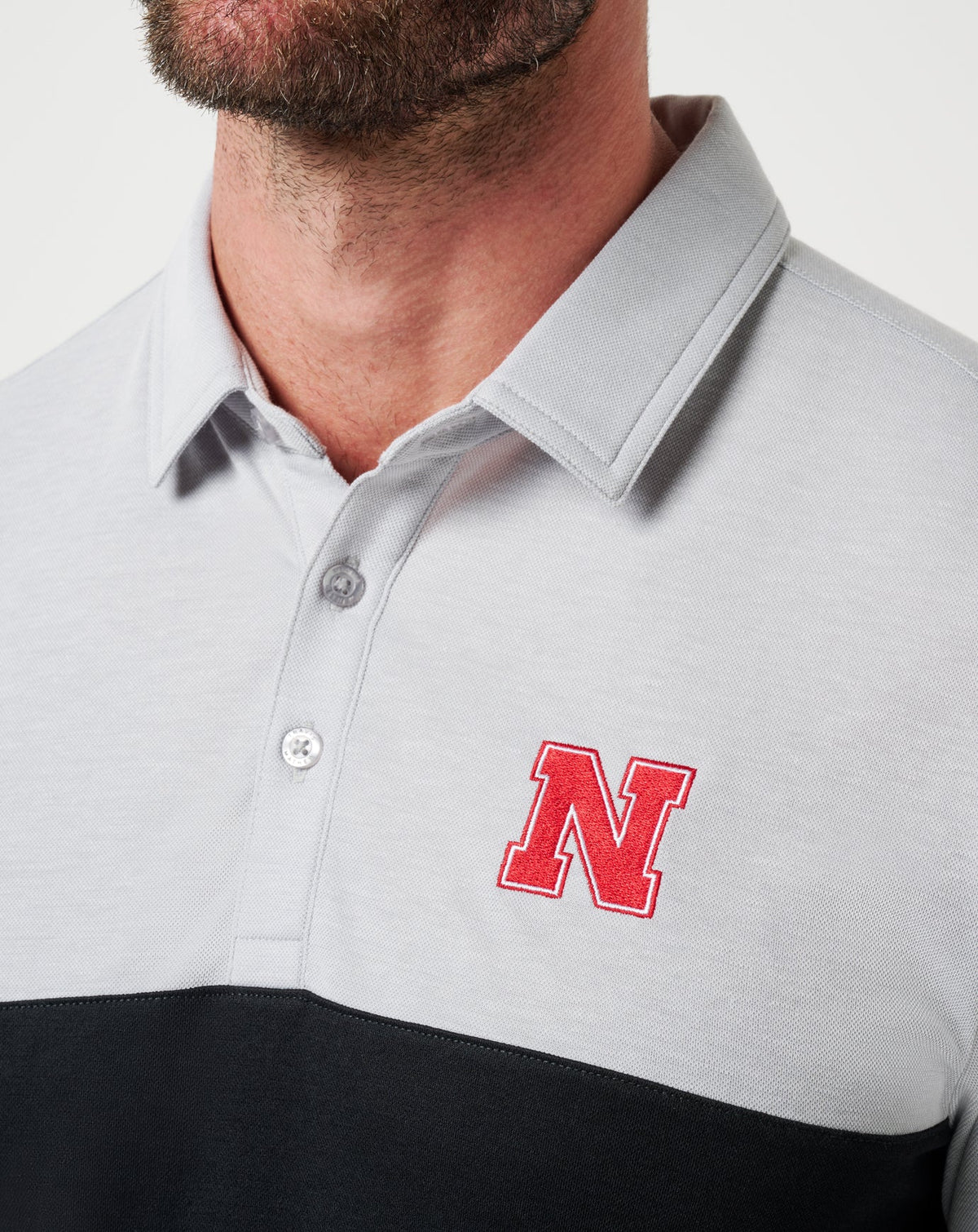 TravisMathew | Nebraska Drop Back Polo - Heather Grey/Black